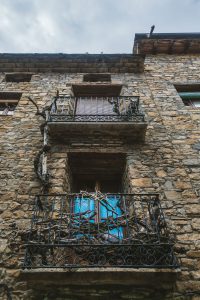 stone facade of old house in Ainsa