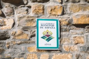 sign that reads Ainsa, one of the prettiest towns of Spain
